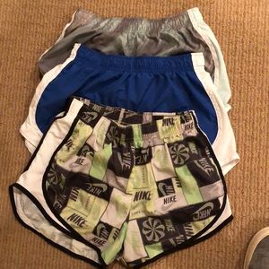 3 Nike Dri-fit running shorts. All women’s size Small.